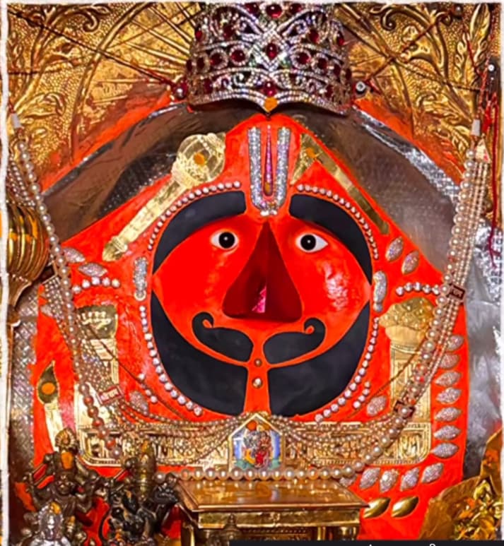 The bearded and moustached murti of Balaji in the sanctum at Salasar, Churu district