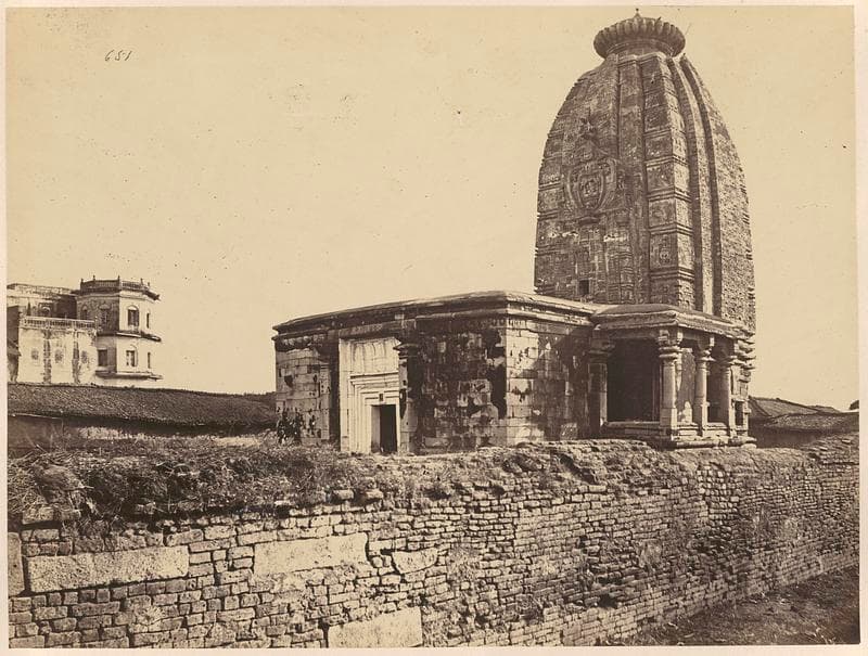 The Deo Surya Mandir in bare stone, photographed about 1870 — the ribbed shikhara and its amalaka over the mandapa and pillared porch
