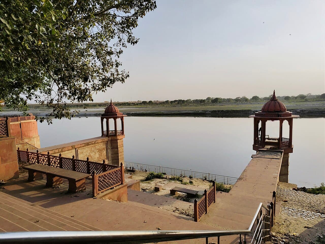 Brahmand Ghat at Gokul, its red sandstone chhatris standing over the Yamuna